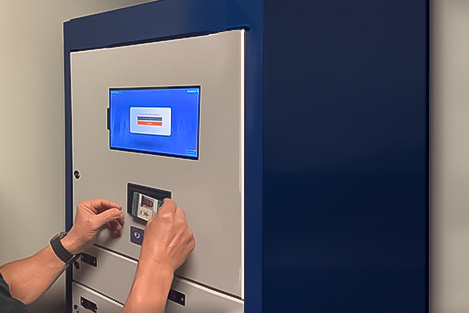 A police officer accessing sensitive evidence using a card